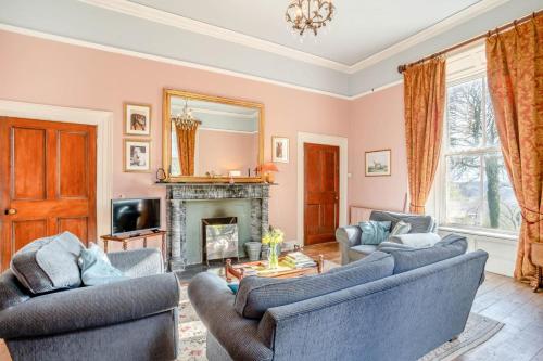 a living room with two couches and a fireplace at 3 Bed in Enniscorthy oc-ii16584 in Enniscorthy