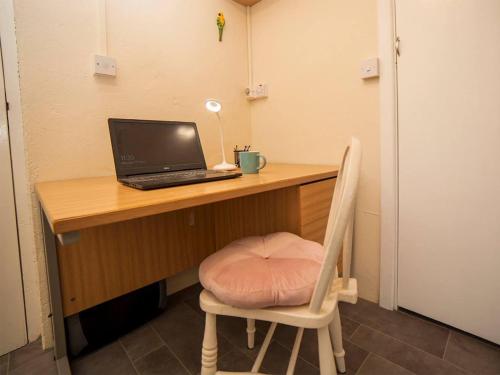a desk with a laptop computer sitting on top of it at 3 Bed in Gweesalia oc-ii16998 in Tullaghanbaun