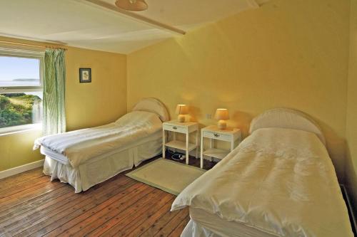 a room with two beds and a window at 3 Bed in Duncannon oc-i041 in Duncannon