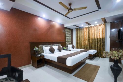 Katil atau katil-katil dalam bilik di Hotel Shivdev International 2 Min Walk From New Delhi Railway Station