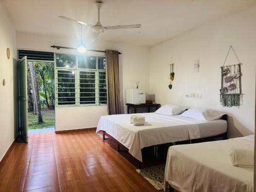 Postel nebo postele na pokoji v ubytování Nice Days