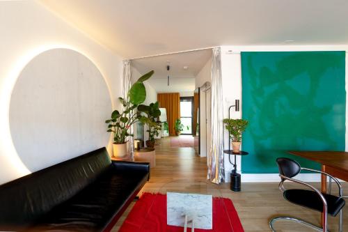 Un lugar para sentarse en Urban Design Loft - Basel - Free Parking