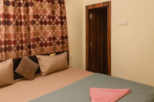 Cama o camas de una habitación en Vinayaka Heritage