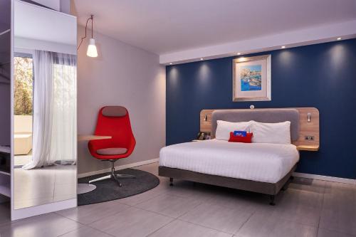 Ένα ή περισσότερα κρεβάτια σε δωμάτιο στο Holiday Inn Express - Malta by IHG