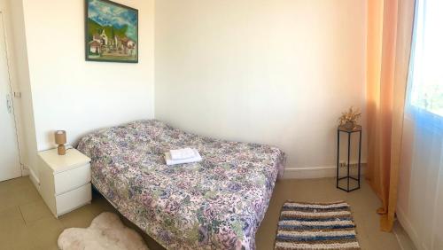 Katil atau katil-katil dalam bilik di Apartament spațios și luminos