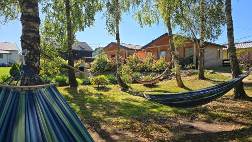 Κήπος έξω από το VIP VILLAGE Las Woda Rower - Podgrzewany Basen, Balia, Sauna
