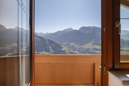 a balcony with a view of a mountain at Zillertalblick in Zell am Ziller