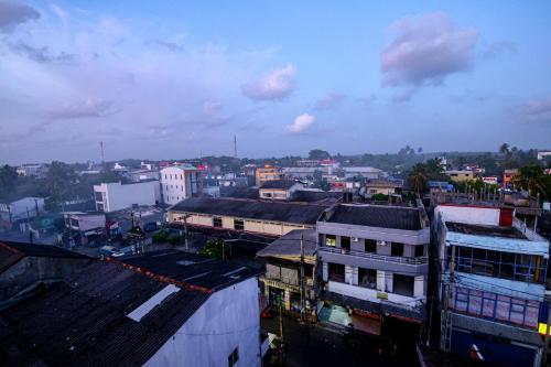 a view of a city with buildings at Harbour View Resort in Ambalangoda