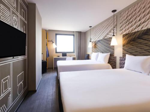 Postel nebo postele na pokoji v ubytování ibis Tijuana