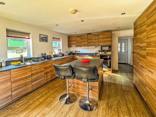 Η κουζίνα ή μικρή κουζίνα στο 4 Bed in Glenarm oc-ii15925