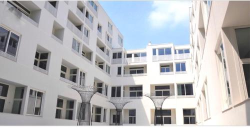 Design loft in the Navigli-Forum area with private parking
