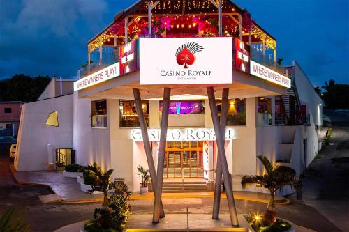 a building with a sign on the front of it at Royal Islander Club Resort La Terrasse in Lowlands