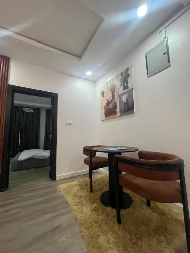 Ένα ή περισσότερα κρεβάτια σε δωμάτιο στο Modern 1 Bedroom Apartment in Lekki with Pool Gym Constant Power and Wi-Fi