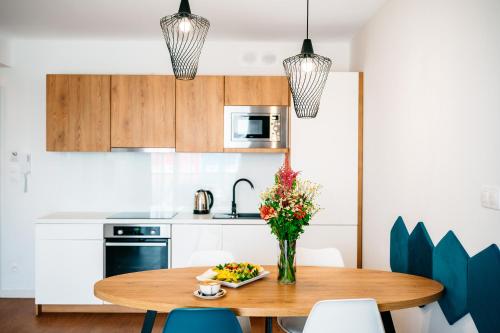 Kuchyň nebo kuchyňský kout v ubytování Blu Apartments