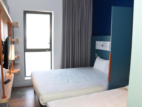 ibis budget Langresにあるベッド