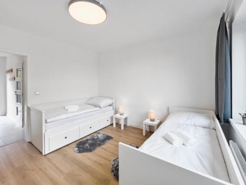 Postel nebo postele na pokoji v ubytování Apartmány Vlastiboř