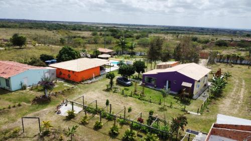 an aerial view of a small village with houses at Casa Roar - Hospedagem in Nossa Senhora da Glória