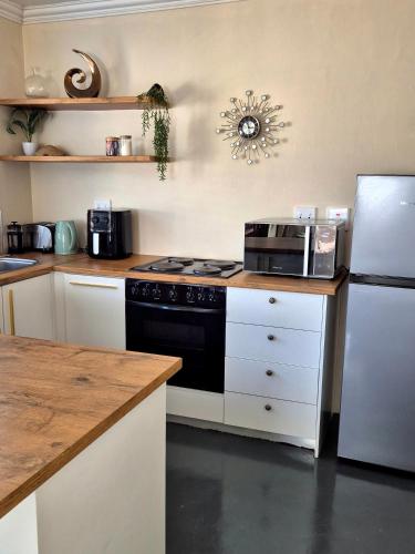 Køkken eller tekøkken på Fortune Cottage