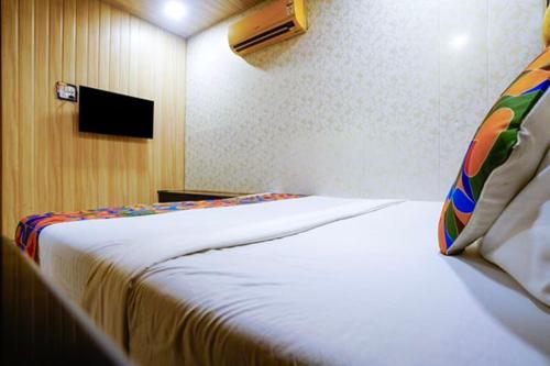 Cama o camas de una habitación en FabExpress Janta