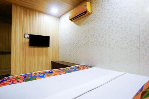 Cama o camas de una habitación en FabExpress Janta