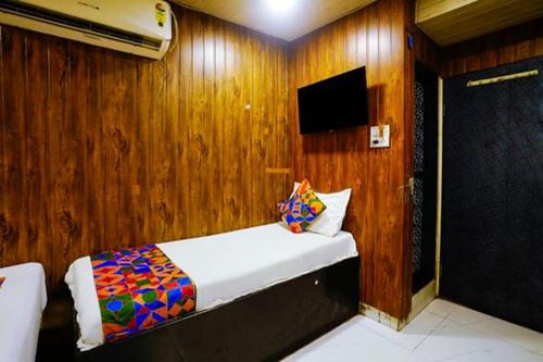 Cama o camas de una habitación en FabExpress Janta