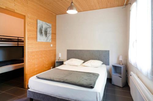 Postel nebo postele na pokoji v ubytování Océan - Domaine Des Landes