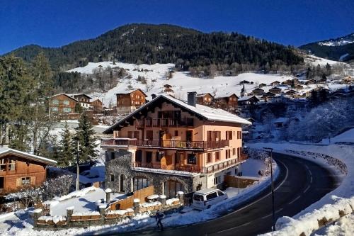 a house in the snow with a mountain at Superb 3 room next to the chairlift in Arêches in Arêches