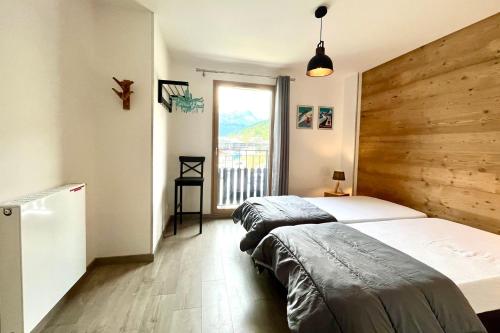 Llit o llits en una habitació de Clair des Prés