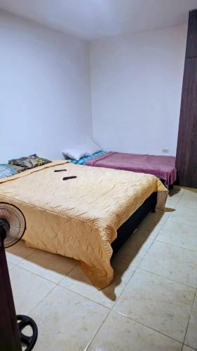 Postel nebo postele na pokoji v ubytování Laureles home