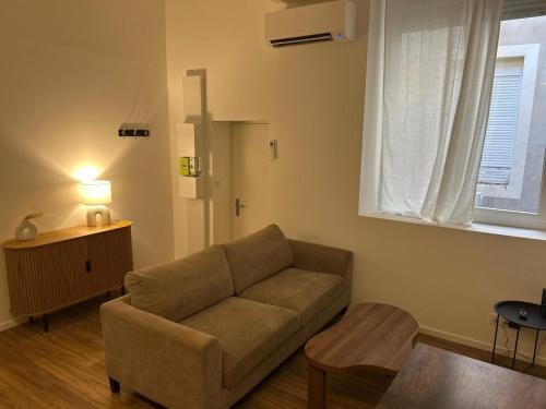 Et opholdsområde på Cozy room apartment Nîmes Centre Coupole Arènes