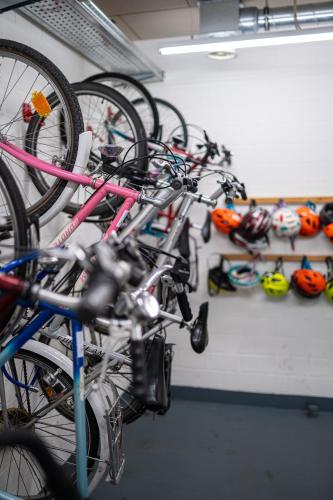 a bunch of bikes are lined up against a wall at Parkhotel Emmaus - Casa Rustico in Ascona