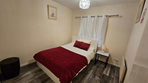 Ένα ή περισσότερα κρεβάτια σε δωμάτιο στο Charlotte Apartment