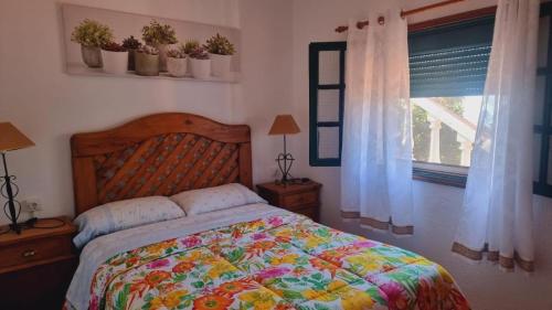 En eller flere senge i et værelse på Casa Isabel