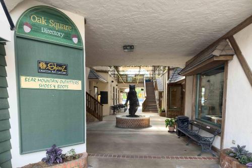a building with a statue in the middle of a walkway at Main Street Elevated in Highlands