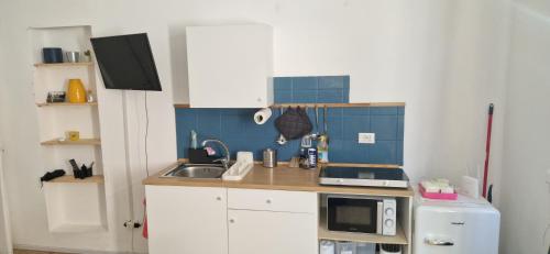 Een keuken of kitchenette bij Suite San Giovanni