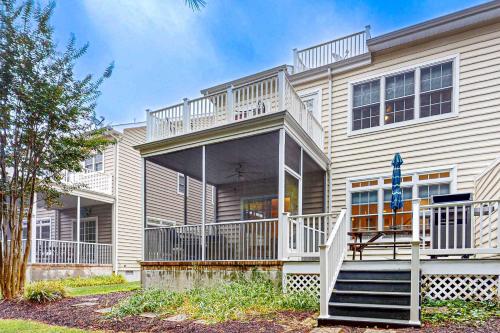 a house with a porch with a deck at Ocean Mist --- 10 Ocean Mist Dr in Ocean View