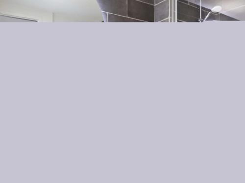 a room with white walls and a white ceiling at Aparthotel Adagio Lille Centre Grand Place in Lille