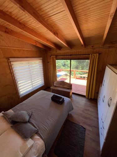 Postel nebo postele na pokoji v ubytování Cabañita del bosque