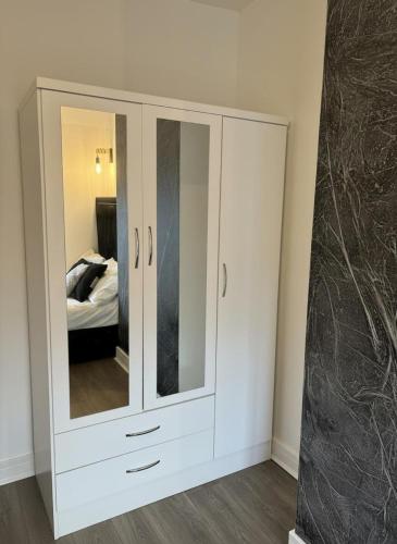 Ένα ή περισσότερα κρεβάτια σε δωμάτιο στο 3-Bed House Sleeps 5 Free Parking