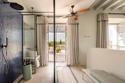 Ένα ή περισσότερα κρεβάτια σε δωμάτιο στο Hotel Son Xotano