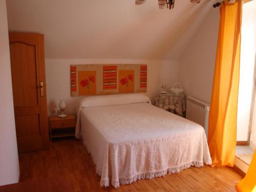 Кровать или кровати в номере Casa Nova de Ribamondego