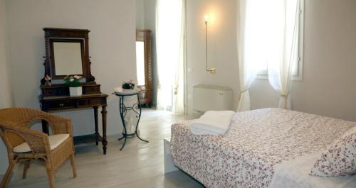 Una cama o camas en una habitación de Bartè