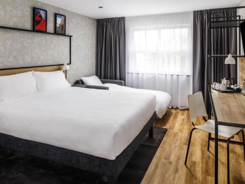Postel nebo postele na pokoji v ubytování ibis Wakefield East-Castleford