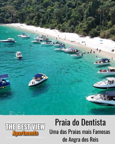a group of boats in the water near a beach at The Best View in Angra dos Reis