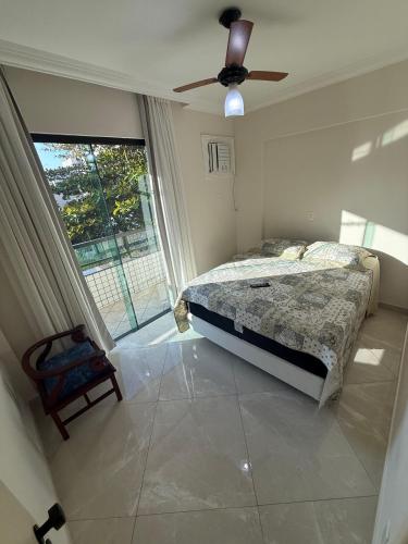 Llit o llits en una habitació de Aconchego do Forte