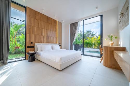 Giường trong phòng chung tại Ardhana 5 - Private Pool Retreat - Brand New Villa