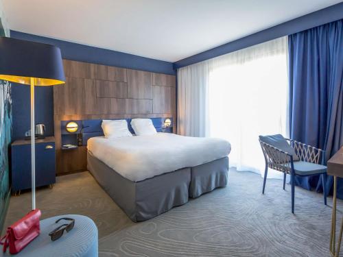 Mercure Marseille Centre Bompard La Cornicheにあるベッド