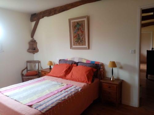 Ένα ή περισσότερα κρεβάτια σε δωμάτιο στο Ricouch, chambre d'hôtes et permaculture