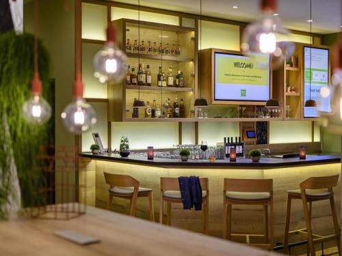 Lounge nebo bar v ubytování Ibis Styles Aschaffenburg