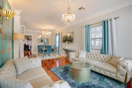 a living room with two white couches and a table at 2 Mi to Audubon Park Glam NOLA Gem in New Orleans